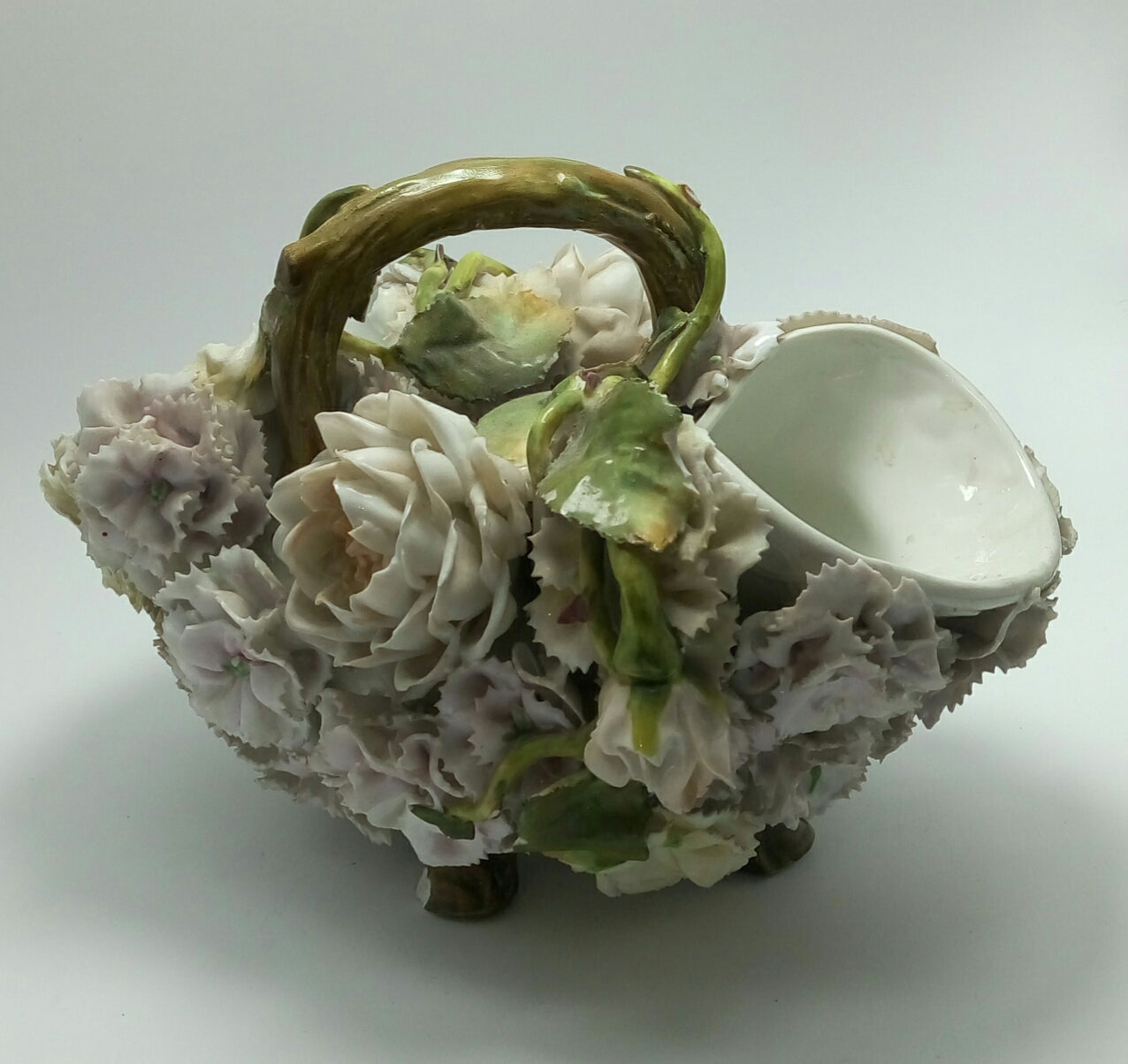 Rarely found delicate porcelain vase,  each hand made petals out of passion and respect for artistry.  In excellent condition.