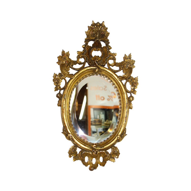 Beautifully handcrafted Rococo style mirror adds glams to any plain wall .