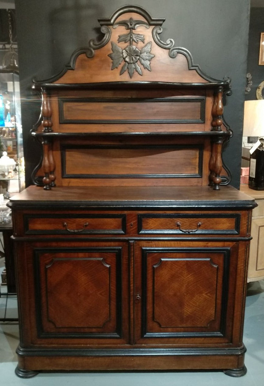Stately built for storing wines and drinks, this buffet feature