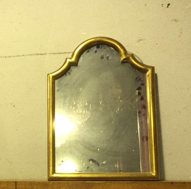 Mirror on top of fireplace