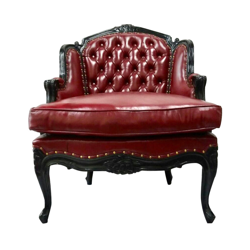 Comfortable Bergère with a solid Mahogany hand carved frame. Chair is available in a variety of finishes, fabrics and leather.